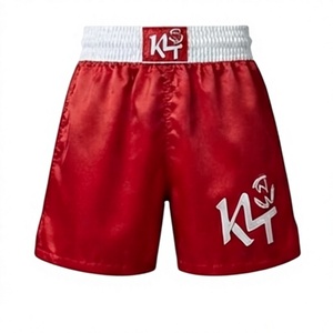 Shorts d'arts martiaux KLTW INT'L K4 rouge unisexe en polyester/coton respirant, coupe ample pour adulte, logo frontal imprimé par sublimation. - Product Image 1