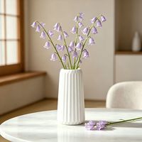 Vase en céramique artisanal minimaliste moderne, objet décoratif pour fleurs séchées ou cultivées en hydroponie/aération, idéal pour la décoration de maisons, hôtels et gîtes.