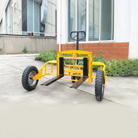 Chariot à palettes tout-terrain manuel JX 1.25T avec pompe hydraulique, roues en PU et levage de 200 mm pour la construction et les terres agricoles