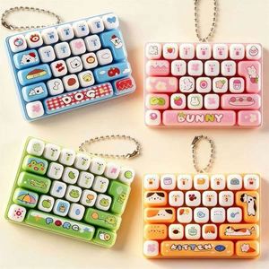 Mini Teclado Descompresivo Transfronterizo 26 Teclas, Juguete de Presión para Dedos, Colgante de Llavero, Bonito Diseño de Dibujos Animados, Impresión UV, PVC, para Estudiantes - Product Image 1