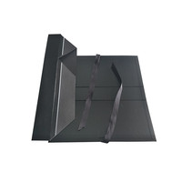 Boîte cadeau rigide magnétique noire de qualité supérieure avec pelliculage brillant, impression dorée et nœud en ruban pour vêtements