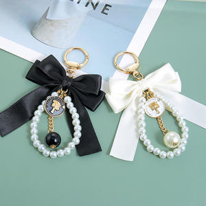 Decoración Colgante para Mochila de Mujer, con Lazo Grande, Cadena de Perlas, Llavero, Cinturón Tejido, Colgante para Bolso, Llaveros de Goma - Product Image 4