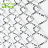 Rideau en maille spirale de draperie de bobine en métal résistant à la corrosion pour entrepôt/cloison de studio/revêtement mural décoratif/ombre de fenêtre