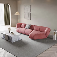Canapé d'angle modulable en velours uni pour salon d'appartement