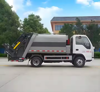 Camion à ordures diesel de compacteur de transmission manuelle d'ISUZU 4x2 nouvel état utilisé de 5.3 mètres cubes pour l'assainissement de construction