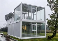 Maison conteneur préfabriquée détachable à faible coût, design moderne, caractéristique respirante pour bureau/hôtel/appartement/ferme