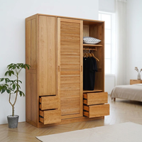 Armoire sur mesure VC Home, design élégant et éco-responsable, avec tiroirs intégrés, pour chambre à coucher tendance.
