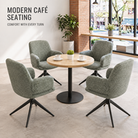 Fauteuil de salle à manger, tissu vert sauge, tissage texturé bouclé, base araignée, table ronde en bois pour café, restaurant et hôtel