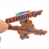 Étiquette autocollante holographique personnalisée en cercle avec logo en colle laser noire pour la promotion, l'épicerie, l'exposition
