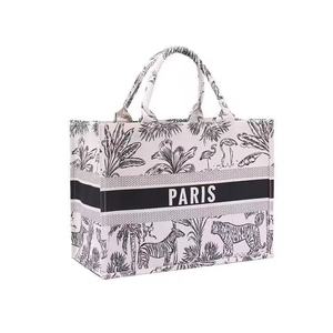 Sacs fourre-tout en <span class=keywords><strong>toile</strong></span> <span class=keywords><strong>de</strong></span> coton <span class=keywords><strong>Toile</strong></span> <span class=keywords><strong>de</strong></span> <span class=keywords><strong>Jouy</strong></span> en gros, imprimé Paris, motif tropical noir et blanc, style français, sac <span class=keywords><strong>de</strong></span> courses réutilisable - Product Image 1