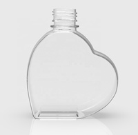 Bouteilles de jus en plastique PET transparentes en forme de cœur avec logo personnalisé, bouteille d'eau potable avec bouchon en PP