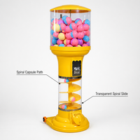 Distributeur automatique de bonbons et de jouets en capsules à monnayeur, avec jeu de boules de gomme et de bonbons rebondissants en spirale