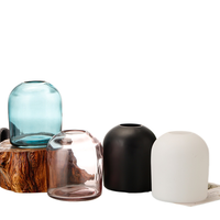 Diffuseur de parfum en verre élégant et personnalisable pour la maison, avec un design moderne et unique