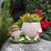 Pot de fleurs en résine en forme de pieuvre souriante mignonne avec voilier et gouvernail, motif de personnage de dessin animé, disponible en OEM et ODM