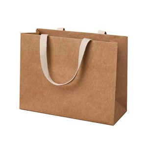 Sac en papier kraft de qualité supérieure avec votre propre logo pour l'emballage de cadeaux, sac en papier laminé de luxe personnalisé, recyclable et verni - Product Image 1