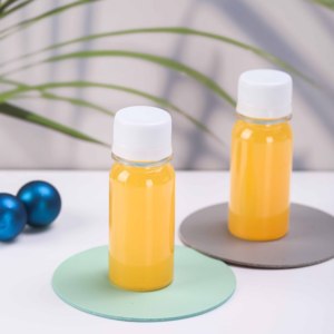 Botella de jengibre transparente sin BPA con pegatina de envoltura retráctil Mini botella de jugo de plástico - Product Image 3