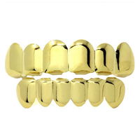 Ensemble de grillz dentaires Hip Hop en laiton plaqué or, style Blues, avec dessus ajouré et dessous ajouré en forme de croc, cadeau pour fête de fiançailles, vente en gros