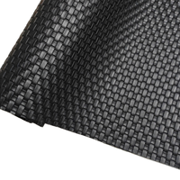 Tapis en cuir artificiel noir PVC bon marché avec texture élastique en relief anti-dérapant au toucher doux pour une utilisation sur les sacs de sièges de voiture