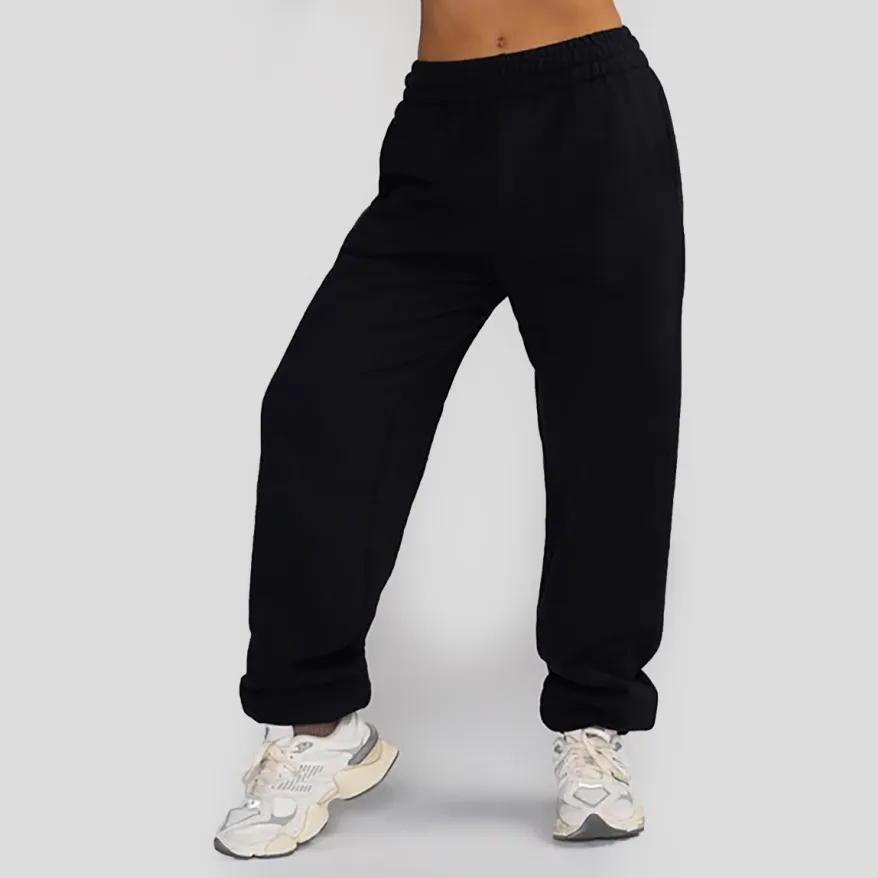 Personalizado al por mayor de alta calidad 100% algodón holgado cintura elástica en blanco entrenamiento deportivo pantalones de Jogger de las mujeres con bolsillo lateral
