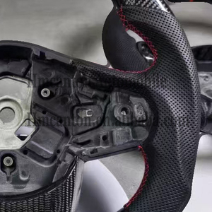 พวงมาลัยรถยนต์ Toyota GR Supra รุ่นใหม่ล่าสุด ผลิตจากคาร์บอนไฟเบอร์และหนังรูพรุน - Product Image 4