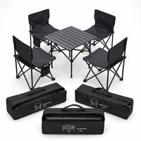 Ensemble table et chaises pliantes de camping tout noir pour 4 personnes, avec dessus roulant, 4 chaises en tissu Oxford et poches de rangement pour les sorties en famille