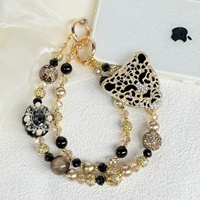Cadena para teléfono móvil con forma de corazón, con perlas y estampado de leopardo, brillante y con diamantes, la más vendida, colgante artesanal para bolso