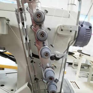Máquina <span class=keywords><strong>de</strong></span> coser industrial <span class=keywords><strong>de</strong></span> alta velocidad <span class=keywords><strong>de</strong></span> triple aguja para elásticos <span class=keywords><strong>de</strong></span> ropa interior masculina y pantalones elásticos RN9200-2 - Product Image 5