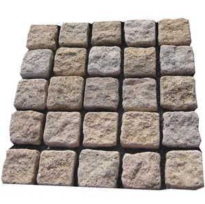 Customized Meshed Chinese G682 Rusty Yellow Granite Natural And Tumbled Cobble Paving Stone Cubes On Net