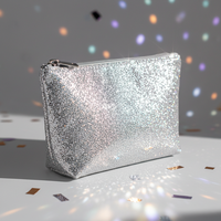 Pochette cosmétique argentée métallisée brillante avec surface pailletée, trousse de maquillage pour femmes, idéale pour les soirées