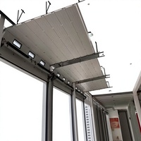 Porte sectionnelle industrielle automatique à vue complète en alliage d'aluminium et verre pour lavage de voitures, atelier 4S, entrepôt, salle d'exposition