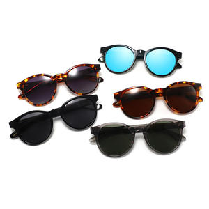 Gafas de Sol Redondas de Estilo Europeo para Hombre, Lentes Polarizadas TAC con Protección UV400, Montura de Acetato Negra, Protección Solar para Viajes y Conducción - Product Image 1