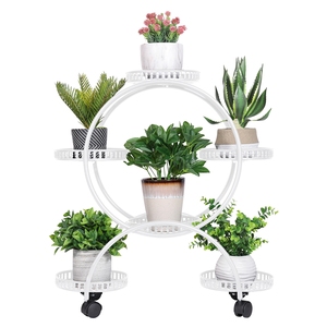 Soporte de Metal para Plantas Unho de 6 <span class=keywords><strong>Macetas</strong></span>: Soporte para <span class=keywords><strong>Macetas</strong></span> <span class=keywords><strong>con</strong></span> <span class=keywords><strong>Ruedas</strong></span>, Estante de Exhibición de 4 Niveles para Patio, Balcón, Jardín, Decoración del Hogar - Product Image 1