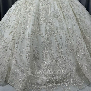 Lscm108 Modern Silver Long Sleeve Beaded Ball Gown Wedding Dress Sweetheart Neckline Chapel Train Floor-Length Feather <b>Sequin</b> - Product Image 4