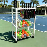 Chariot de rangement mobile en métal pour équipement sportif, idéal pour l'affichage des raquettes de tennis et de pickleball, avec roues, modèle Trykid, pour terrains de sport et clubs.