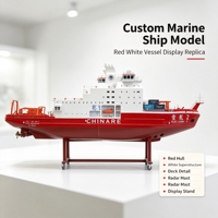 Maquette de navire maritime rouge et blanc