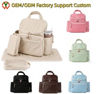 Sac à langer multifonctionnel grande capacité avec matelas à langer, crochet pour poussette, pochette pour bagage, sac à dos à couches, sac de voyage pour bébé