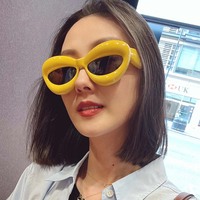 Lunettes de soleil œil de chat pour femmes, tendance, pas chères, vente en gros, classiques, populaires, en plastique