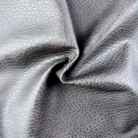 Kohlenstoffschwarzer Lychee-Textur Wasserbasierter PU-Lederstoff 1,0 mm Dick Gestrickter Oberbekleidungsstoff Maßgeschneiderte Breite PU-Lederstoff