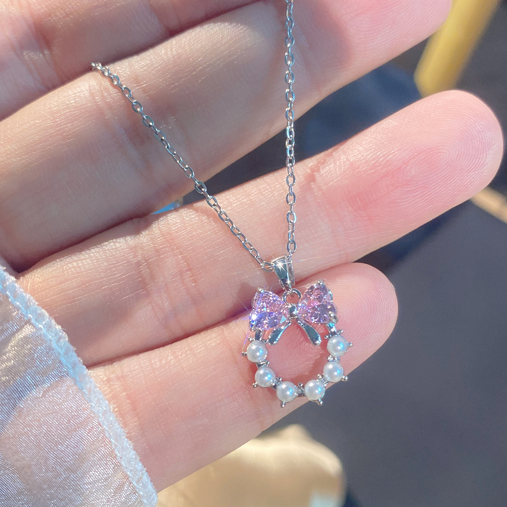 D12 : Argent, rose, diamant, perle, cercle, nœud