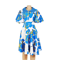Gaun pesta wanita ukuran besar model A-line berbahan voile spandex dengan motif bunga manis, kerah O-neck, panjang lutut, dan saku.