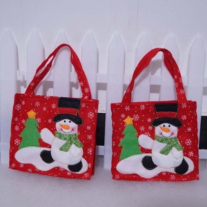 Sacs fourre-tout de Noël en feutre écologiques et durables avec poignées, sacs cadeaux réutilisables pour les fournitures de fête pour enfants, fête de vacances - Product Image 1