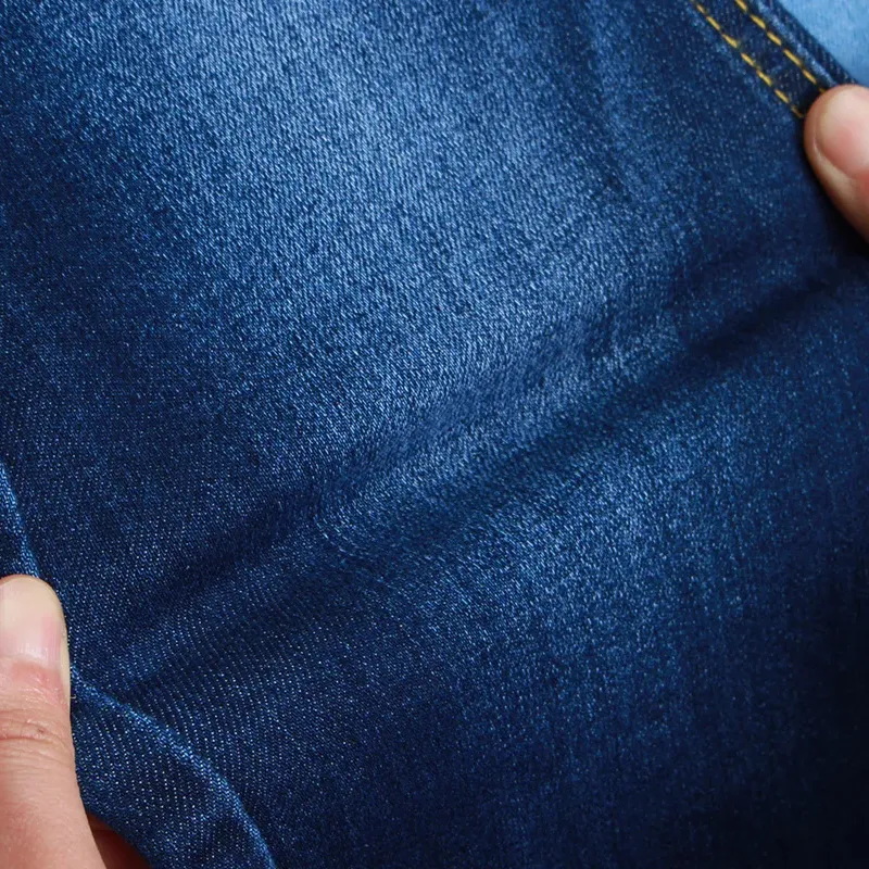 Kadınlar için 10oz 58/59 "çözgü düğümlü denim kumaş streç kot kumaş çin üreticileri Siro iplik