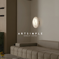 Applique murale artisanale en albâtre en forme de galet |   Applique murale LED minimaliste en laiton pour couloir