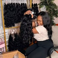 Vente en gros de cheveux indiens bruts à double étirage 100% cheveux humains alignés sur les cuticules fournisseurs de paquets de cheveux bruts ondulés de donneur
