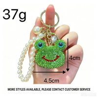 Porte-clés en alliage en forme de grenouille mignon, très tendance, avec strass étincelants, pendentif pour sac à main de femme pour les trajets quotidiens