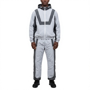 Ensemble de survêtement décontracté gris pour homme avec blocs de couleur, veste et pantalon respirants en polyester, coupe-vent personnalisable avec LOGO, idéal pour l'automne - Product Image 1
