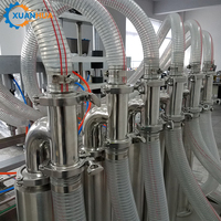 Machine de remplissage automatique à 4 têtes pour bouteilles en plastique (huile et poudre) de 5 gallons, haute précision, entraînement électrique
