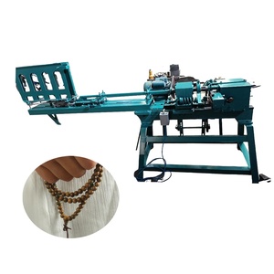 Machine automatique à perles en palissandre à petites feuilles Fil d'or Perçage concentrique Perles ovales-Moteur de noyau de machines à bois - Product Image 1