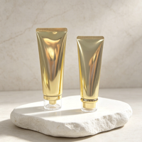 Tube cosmétique de luxe en PE or et argent, vente en gros, personnalisé, 80 ml, 100 ml, emballage vide pour nettoyant visage, crème de soin, avec bouchon à vis