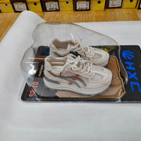 Boîte d'emballage en blister personnalisée pour chaussures, emballage en plastique transparent PET avec crochet européen, fabrication OEM ODM